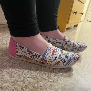 Toms x Monopoly slip on shoes.
